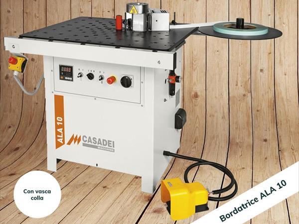 Bordatrice manuale con vasca colla